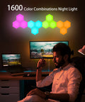 Hexagon LED Wall Light Kit 6 Pack With Modular Touch And Remote Control above desk in colorful pattern
