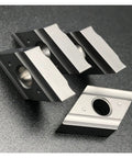 Image showing indexable carbide inserts designed for Snag This Heavy Duty Indexable Carbide Lathe Tool For Machining Mild Steel Stainless And Cast Iron With High Hardness Low Friction And Top Toughness For Your CNC Cutting Needs Right Now.