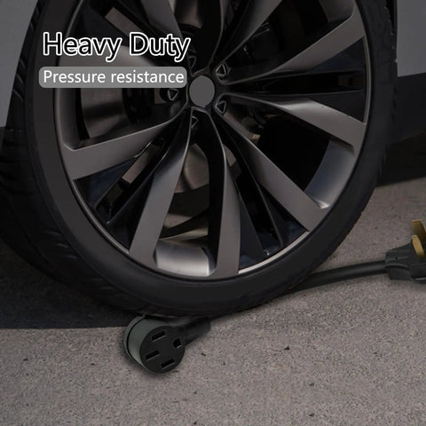 6-50P To 14-50R EV Charger Adapter Cord under car tire, showing heavy-duty build and pressure resistance for Level 2 EV Charging.