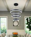 Modern Black LED Ring Chandelier With Three Adjustable Tiered Cylinders Hangs Flawlessly Over Kitchen Islands Or Bedrooms Quick Install Setup in a dining room.