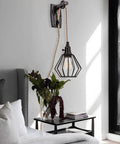 Two Pack Plug In Farmhouse Wall Sconces Set With Industrial Wheel Cage Shade In Black, 13ft Hemp Rope Cord installed in bedroom