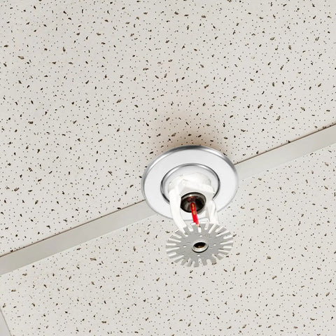 Ceiling installation of 18 Piece Heavy Duty Metal Sprinkler Escutcheon Plates, heat resistant and modern design.
