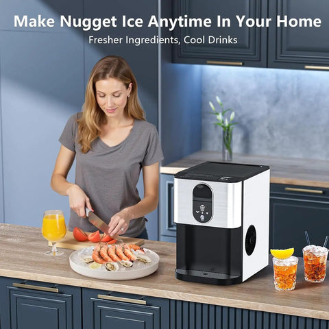 Woman preparing food in kitchen with Party Ready Nugget Ice Maker For Countertop With 44 Lbs Per Day next to drinks.