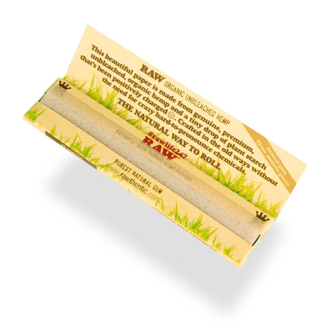 Open pack of King Size Slim Organic Hemp Rolling Papers, 110x44 mm, translucent and ultra-thin, made with natural gum.