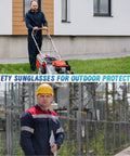 150 Piece Clear Safety Glasses Bulk ANSI Z87 1 Certified Eye Protection Built Tough For Men And Women High Impact Workwear worn by outdoor workers.