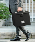 Heavy Duty Fireproof Document Box With Handle Portable Waterproof File Organizer being carried by a person outdoors
