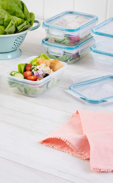 Total Solution Five Pack Three Cup Food Storage Containers With Leakproof Airtight Lids, filled with salad, shown in a kitchen setting