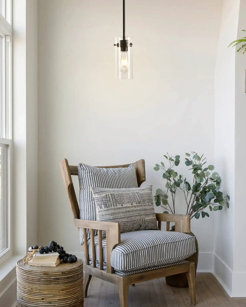 Industrial Pendant Light Fixture With Clear Glass Shade, Vintage Hanging Lighting For Kitchen Island, Dining Room, Hallway, And Bedroom, E26 Base UL Listed, Rustic Farmhouse Vibe Ceiling Light hanging above a wooden chair in a cozy corner.
