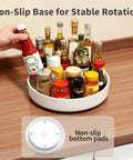 Large Capacity Lazy Susan Organizer For Pantry Cabinet And Kitchen Storage Featuring Super Slick 360 Spinner Turntable Spice Rack with non-slip base holding various condiments.