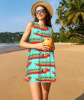 Woman wearing Summer Sleeveless Round Neck Dress For Women With Pockets holding a coconut on a beach, tropical design visible