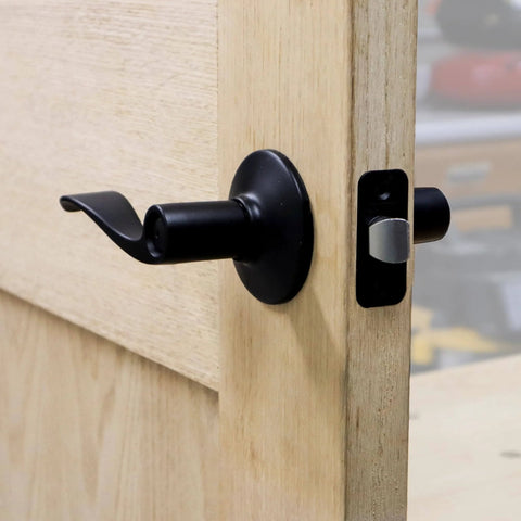 Installed door handle using Lock Mate Plus Self Clamping Professional Door Lock Installation Kit for wood and metal doors.