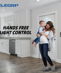 Woman holding child near Occupancy Motion Sensor Light Switch PIR Infrared No Neutral Wire Required Grounding Wire Required For Function Single Pole For CFL LED Incandescent Bulbs Matte Black Wall Plate Included UL Listed 10 Pack installed in kitchen.