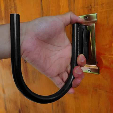 Hand installing E Track J Hooks Heavy Duty Hanging Hooks For Trailers Built Tough Permanent Steel J Fasteners on wood