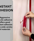 Person applying Construction Seaming Tape 8087CW, 1 Roll Red, 72 mm x 50 m to seal moisture barrier with acrylic adhesive.