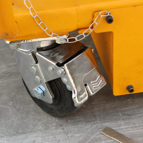 Close-up of dual locking caster on Boss Grade Electric Hydraulic Lift Table With 2600 Lbs Capacity And Dual Locking Casters.