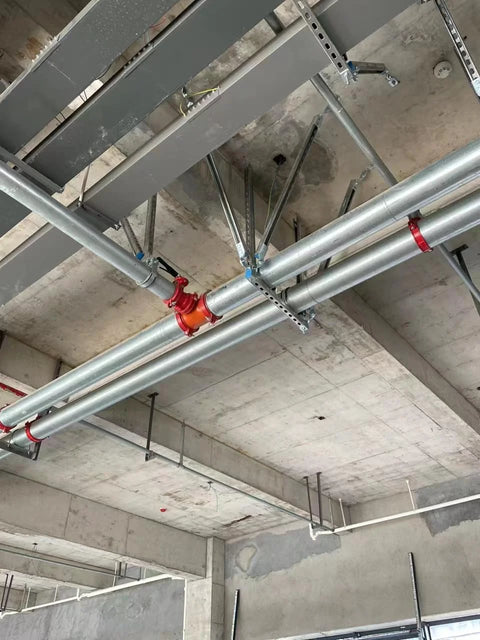 57 Inch Strut Channel Trolley Track in 1-5/8 Inch x 1-5/8 Inch profile mounted on concrete ceiling with pipes, galvanized finish