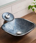 Slick Square Tempered Glass Vessel Sink For Modern Bathroom Vanity Countertops with smooth waterfall flow and anti leak design.