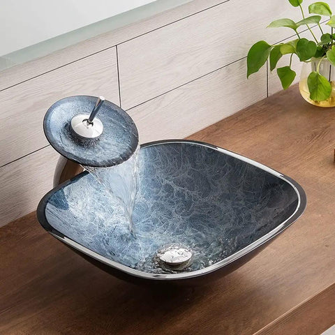 Slick Square Tempered Glass Vessel Sink For Modern Bathroom Vanity Countertops with smooth waterfall flow and anti leak design.