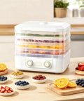 Big Time 6 Tray Food Dehydrator For Home With Clear Racks And Digital Temperature Timer Controls To Knock Out Homemade Jerky Dried Fruit Veggies And Dog Treats Quick As Can Be, shown with dried fruits.