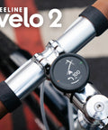 Velo 2 Bike GPS Computer With Wireless Global Navigation for Cycling mounted on handlebars showing route direction.
