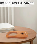 Portable 7-String Lyre Harp Kit For Adults With Wooden Body on table, simple appearance, compact instrument for practice