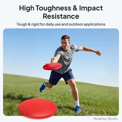 Person playing frisbee outdoors demonstrating high toughness using ASA 1.75mm 1Kg UV Weather Resistant 3D Printer Filament.