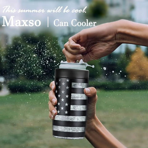 Person opening a drink with 4 In 1 Slim Can Cooler Insulated Stainless Steel Holder Fits 12 Oz Cans Regular Cans Beer Bottles And Drinking Cup Double Wall Keeps Drinks Icy Cold Black American Flag in park setting.