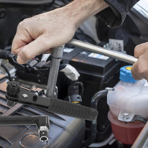 Mini Ratchet Wrench Set With L-handle Socket Tools For Auto Repairs And Home Fixes Durable Steel Construction in use on engine.