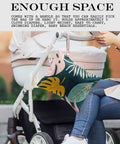 Waterproof Wet Bag For Travel And Beach Days, 26x32cm design with palm leaf tropical print, hanging on stroller handle.