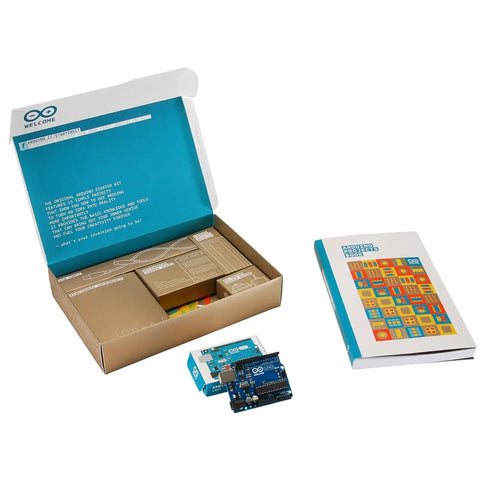 Top Shelf Electronics Learning Kit For Absolute Beginners With Straight Up Step By Step Guides Featuring Compatible Sensor Modules And Robot Tools To Fast Track Your Maker Projects, showing open starter kit with Arduino board and guide.