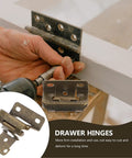 Hand installing self closing cabinet door hinges with soft closure iron material in brushed satin finish on white cabinet frame