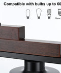 Close-up of wood accent on Five Light Farmhouse Dining Room Chandelier Over Table In Matte Black With Rustic Wood Accents And Clear Glass Shades