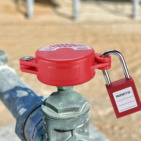 Heavy Duty Gate Valve Lockout Set With Keyed Alike Safety Padlocks installed on industrial valve outdoors.