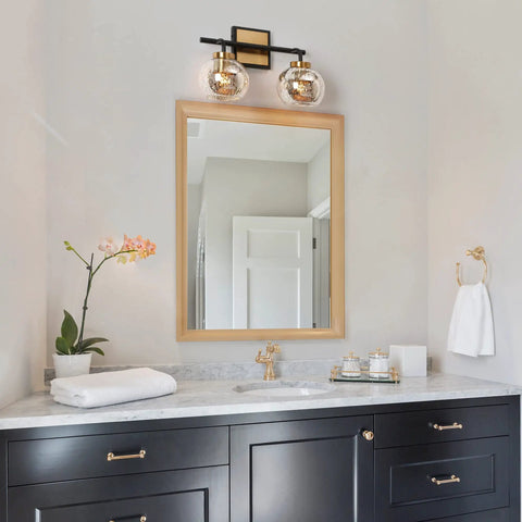 Modern Vanity Light Over Mirror With Mercury Glass Shades In Black And Gold Finish for Bathroom over a marble countertop