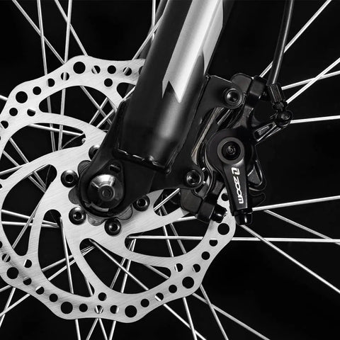 Close-up view of Rock Solid Mountain Bike Mechanical Disc Brake Set With Aluminum Alloy Calipers, showcasing rotor and caliper.