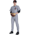 Baseball player wearing Pro Weight Four Way Stretch 14 Ounce Tapered Baseball Pants For Adults White With Black Pinstripes Open Bottom Tailored Fit TEK KNIT Polyester Durable Gameday Ready Pant, holding a glove in front.