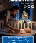 Woman adjusting Cooling Misting Stroller Fan With 6000mAh Battery, Portable Personal Fan With Light near sleeping baby