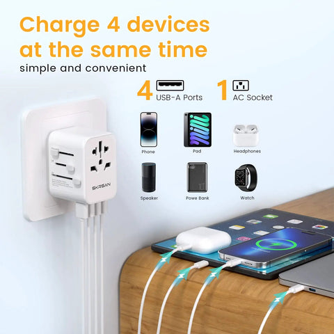 Universal Travel Plug Adapter With 4 USB Ports And Wall Charger, charging multiple devices simultaneously on bedside table.