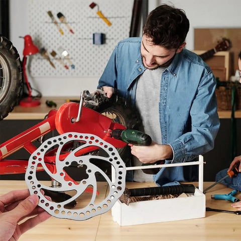Complete Front And Rear Mechanical Disc Brake Kit With Heavy Duty Rotors And Precision Calipers Plus All Mounting Bolts For Mountain Bikes displayed during installation.