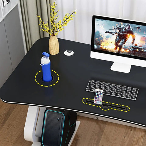 Modern White Gaming Desk Featuring A Built In Phone Slot And Side Storage Shelf, Ergonomic Arc Edge Layout For Smooth Typing, Hella Durable Pc Workstation Ideal For College Rooms Or Epic Gaming Setups with blue water bottle and keyboard.