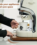 Rock Solid Wooden Appliance Slider With 360 Rolling Wheels For Coffee Makers, shown sliding an espresso machine.