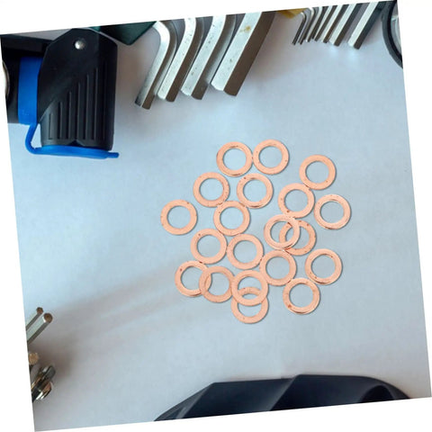 Must Have Go To 20 Piece Flat Copper Washer Kit For Automotive And Plumbing, High Precision Sealing Gaskets For Oil Drain Plug And Hydraulic Fittings, Copper Washers For Leak Free Performance And Quick Heat Dissipation. 20 flat copper washers on a light surface