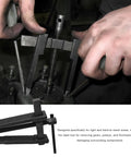 Two Jaws Bearing Puller 8 Inch Adjustable Steel Removal Tool For Auto Gear Work in use on a mechanical component