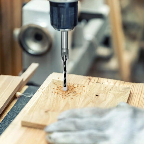 Badass 4 Piece Steel Mortising Chisels Set Knocking Out Crisp Square Hole Cuts For Precision Woodworking Joints, drilling into wood with hollow bit.