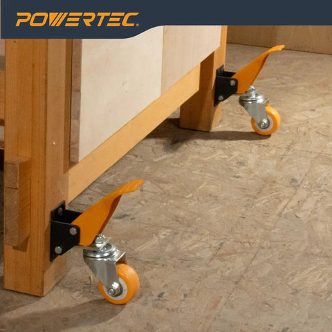 Heavy Duty Workbench Caster Kit With Retractable Stepdown Swivel Wheels Set Of Four Two Point Five Inch TPR Casters 600 Pound Rock Solid Shop Furniture Gear For Hassle Free Rolling close-up of orange foot pedal and swivel wheel