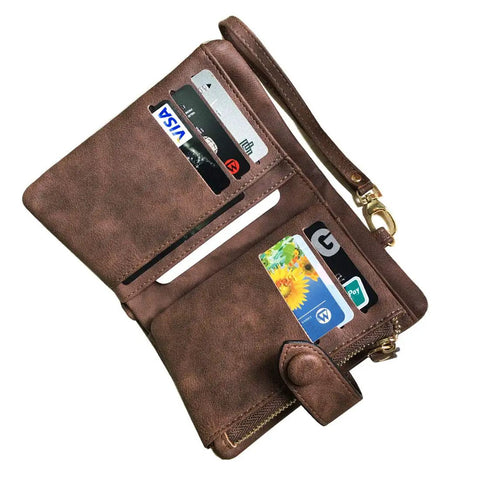 Open view of Must Have Women's Small Bifold Leather Wallet With RFID Blocking And Wristlet Strap, showing card slots and strap, brown.