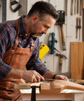 Woodworker using Pro Grade Aluminum Miter Track Jigs T Slot Guide for precision crafting at a workbench