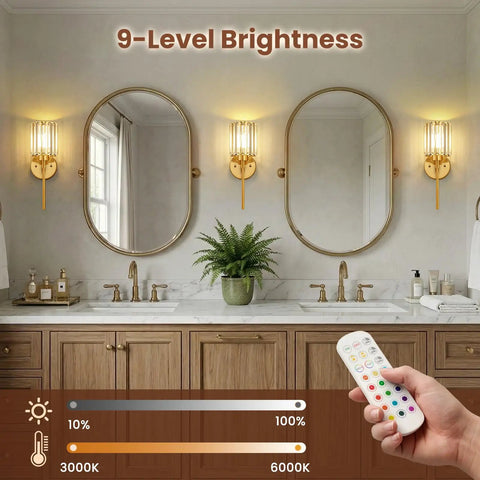 Two Pack Crystal Rechargeable Wireless Wall Sconces Featuring Brushed Gold Finish With Adjustable Dimming Remote And Multi Hue Settings built in a stylish bathroom.