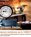 Pressure gauge showing 12000 PSI on One Hand Ready Ultra Compact Locking Grease Gun Coupler With Twelve Inch Flex Hose Twelve Thousand PSI Quick Release One Eighth Inch NPT Fitting Fits All Grease Guns Cleaning Tool Included Built Tough For Tight Spaces