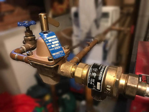 Installed Bronze Heavy Duty High Capacity Water Feed Regulator With Half Inch Union Solder Inlet, Purge Lever, and Check Valve
